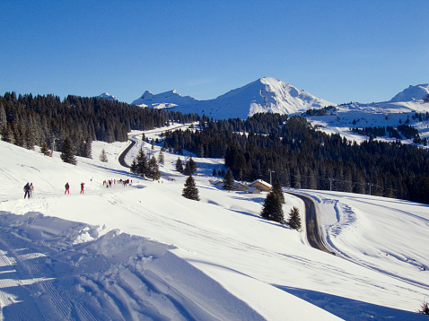 Ski run in the French  near Morzine, France with Switzerland in the background