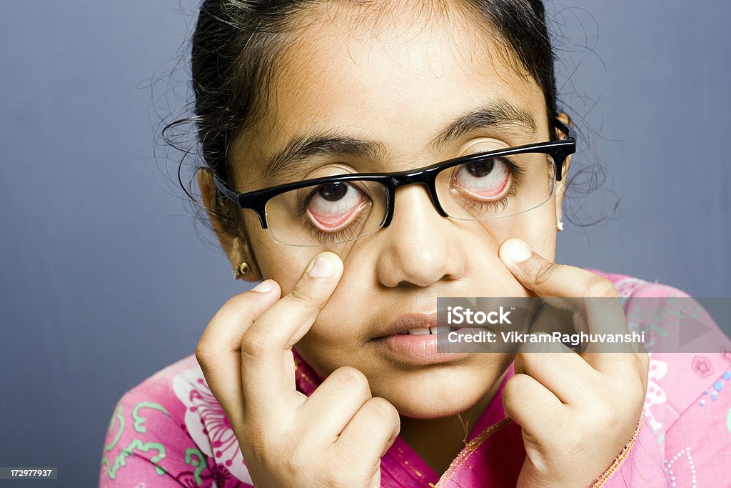 One Little Indian Girl Pulling Making Funny Faces Stock Photo - Download  Image Now - 10-11 Years, 6-7 Years, 8-9 Years - iStock