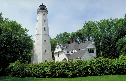 This lighthouse guards the entrance to the Milwaukee River from Lake Michigan.