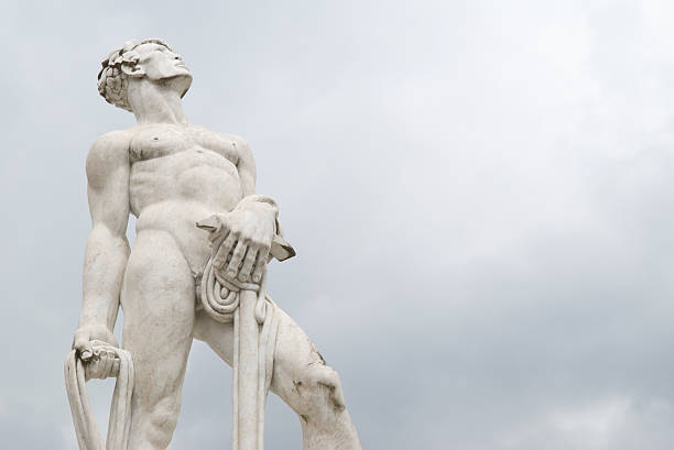 istock White Marble Athlete Stands Holding Sporting Equipment 172978155