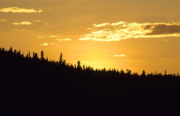 Sunset over mountains stock photo