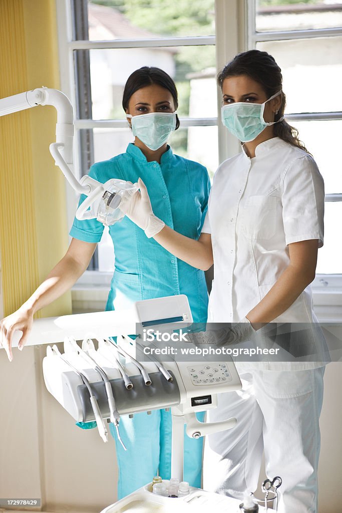 Dental lavoro di squadra - Foto stock royalty-free di Adulto