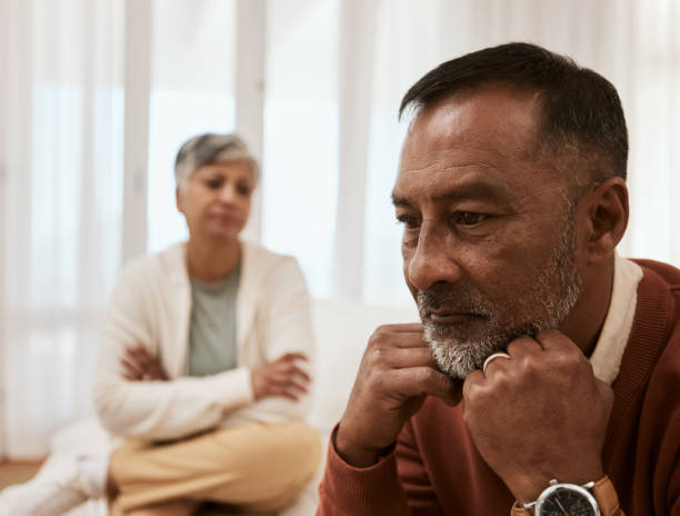 istock Stress, divorce and senior couple on sofa ignore, argue and mistake, problem or issue in their home. Marriage, conflict and frustrated old woman with man in living room for debt, depression or crisis 1729784551
