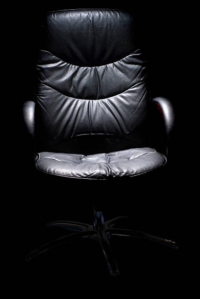 istock Black chair against a dark background 172979210
