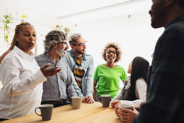 istock Happy multiracial coworkers with different ages and ethnicities having a break during work time 1729793789