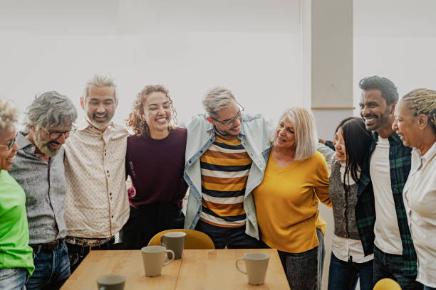 istock Happy multiracial people with different ages and ethnicities having fun drinking a cup of coffee at home 1729794301