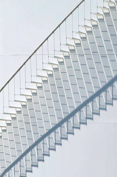 istock Elegant White Staircase With Intricate Shadow 172979437