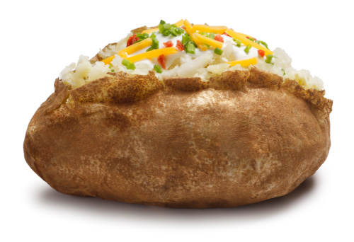 A baked potato on white with soft shadow.