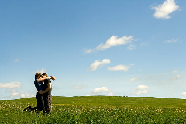 istock Young Happy Couple in The Field 172979918