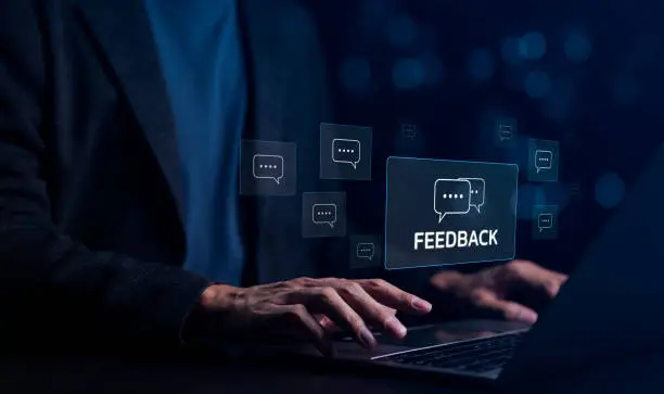 Photo of Customer feedback management concept. Businessman collects information from customer satisfaction to develop products and services. Brand reputation management, Relationship manager, User comment,