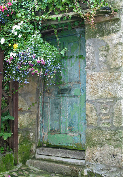 istock Old rustic door and flowers in St. Ives, Cornwall, England 172980095