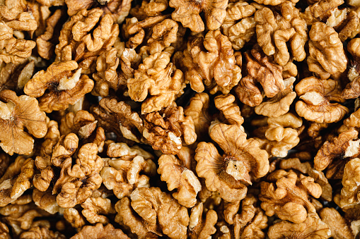 Full frame of peeled walnuts. Fresh and nutritious walnuts.