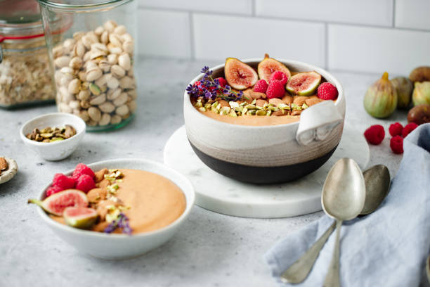 istock Smoothie bowls garnished with dry fruits 1729805268