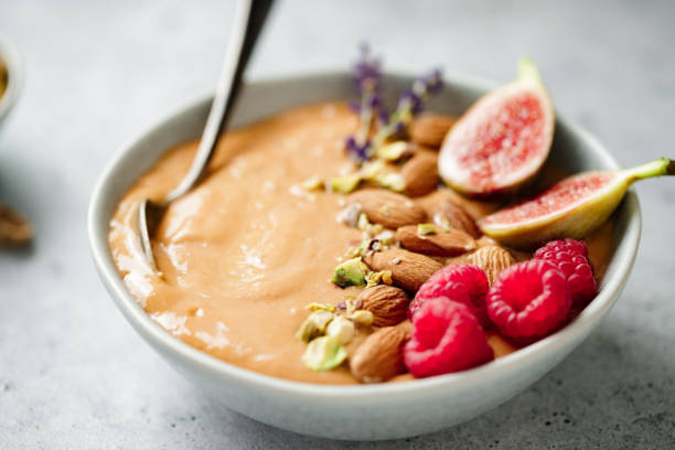 istock Close-up of healthy smoothie on kitchen counter 1729805288