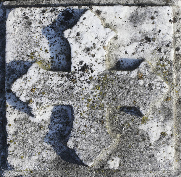 istock Weathered square ornamental marble tile stone cross 172981538