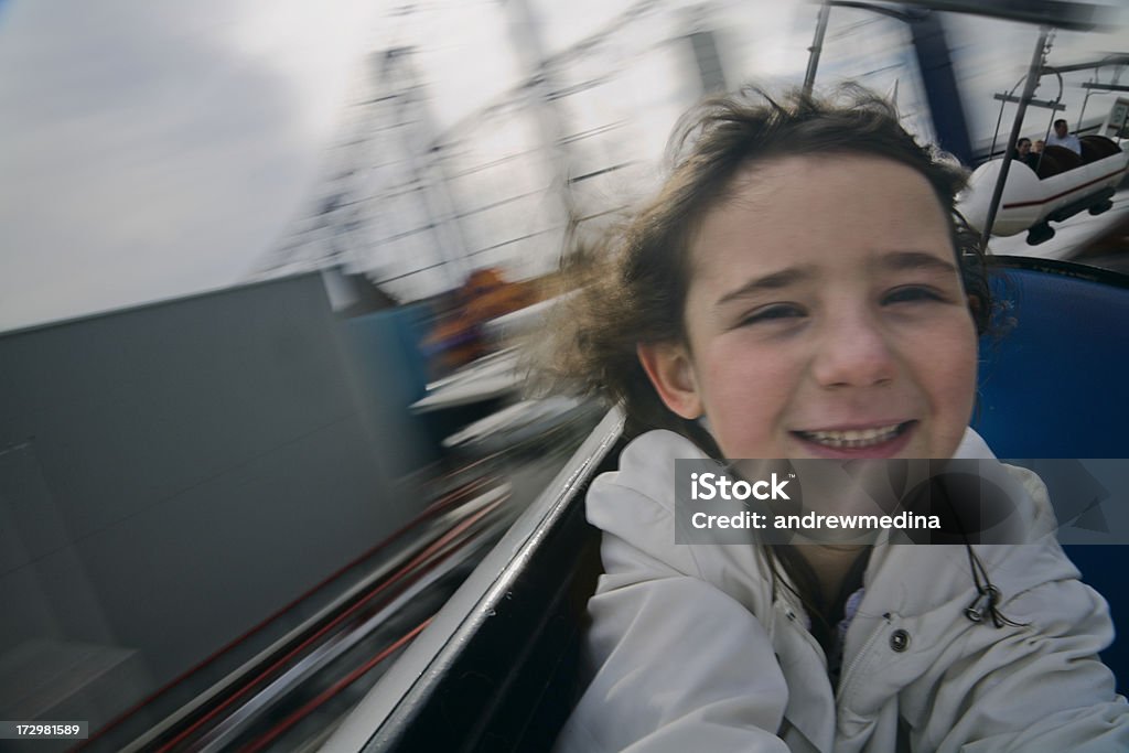 Flying Fun. Click below for similar More views of the same ride 6-7 Years Stock Photo