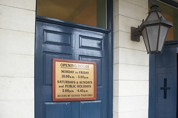 istock Opening hours sign on door 172981651