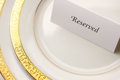 Reserved seat at a formal dinner