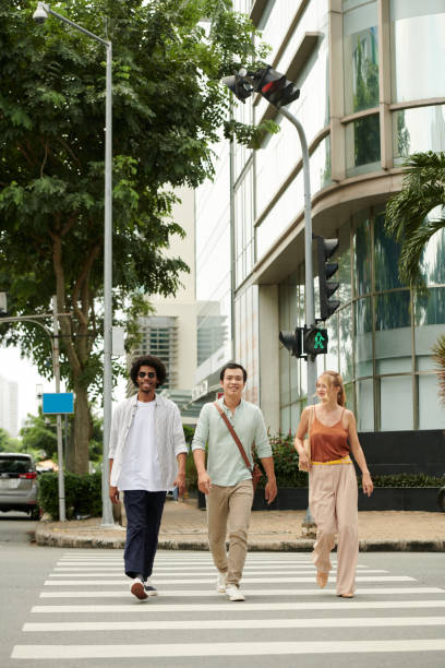 istock Young People Crossing Road 1729827221