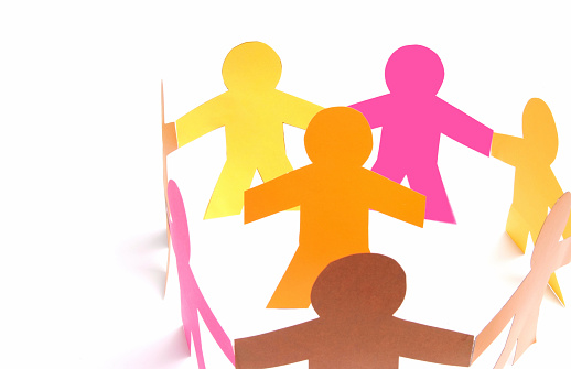 Young family, safety and health concept. Paper figures of people on a pink background.