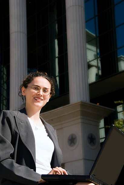 istock Young businesswoman posing outside a building 172983814