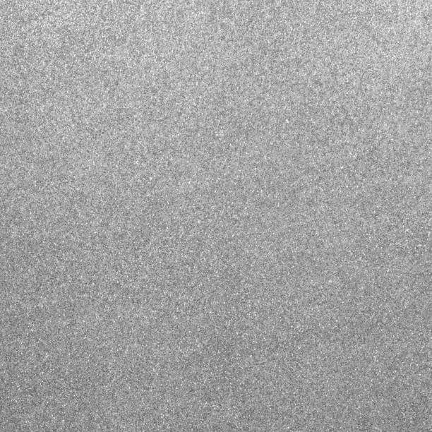 istock GREY LIGHT GLITTER sparkling background with bright reflections and many small lights 1729850569