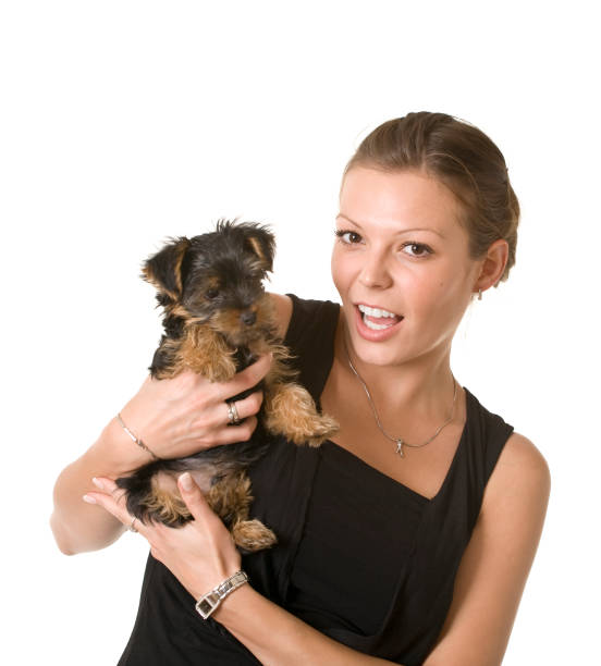 istock young beautiful woman witha a small dog 172985165