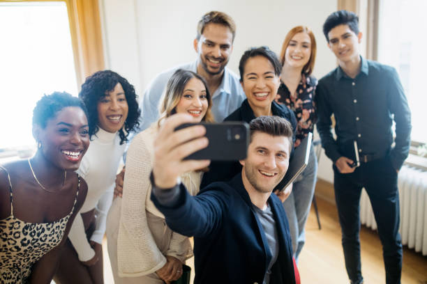 istock Team Photo In Shared Office Collective Space 1729852768