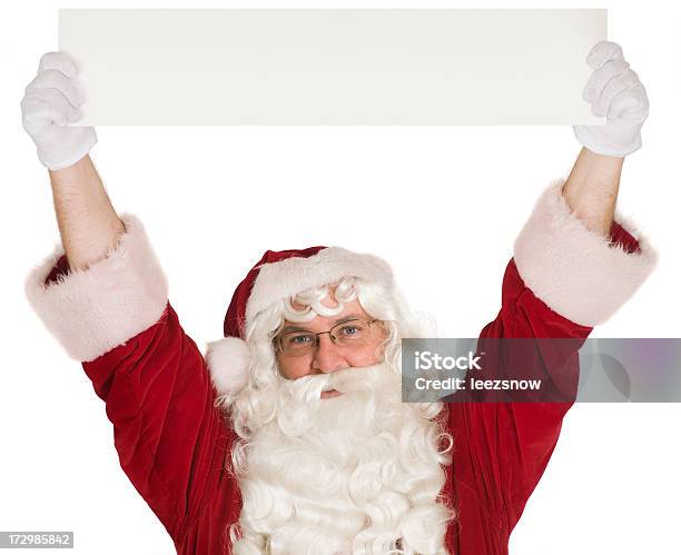 Santa Holding A Banner Overhead Stock Photo - Download Image Now - Above, Banner - Sign, Blank