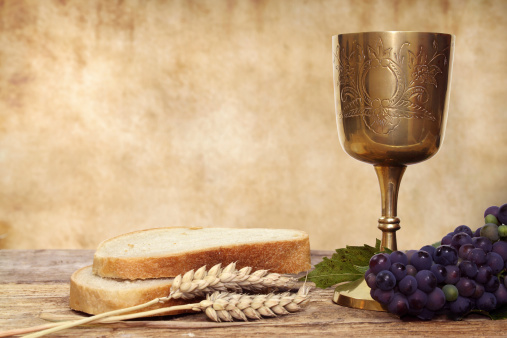 Composition of Communion chalice and bread