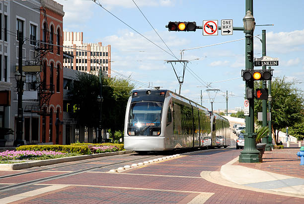 istock Metro Train At Yellow Traffic Signal Light 172987664