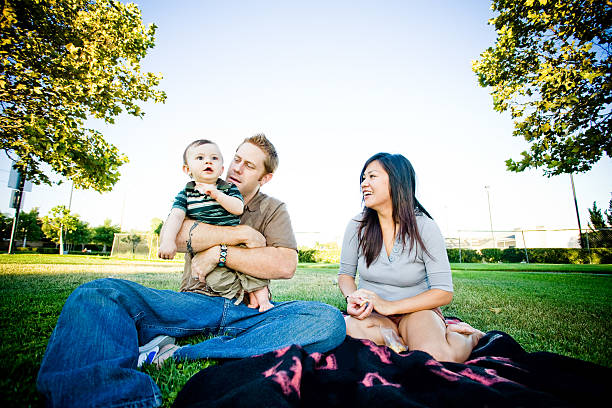 istock multi ethnic family at the park on blanket 172988022