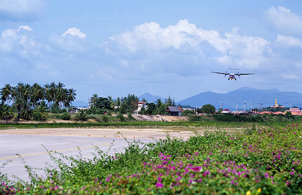 istock Aircraft landing at Samui with big buddha in background 172988324