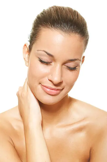 Closeup beautiful woman with closed eyes enjoy relief after neck massage