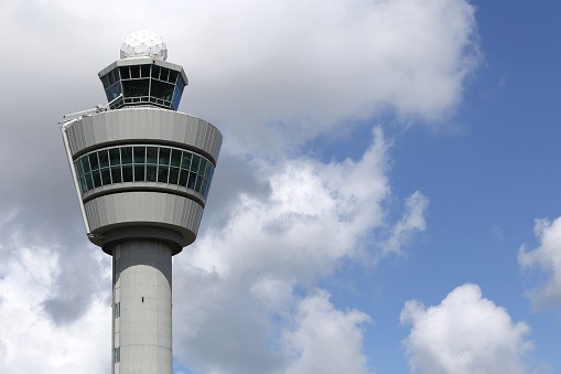 Amsterdam, Netherlands - July 3, 2016: air traffic control tower of Amsterdam Airport Schiphol