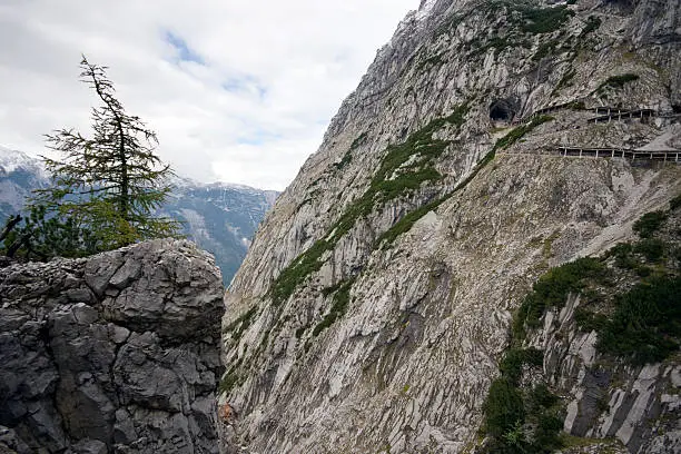 Cliff-side hiking trail runs along the top-right edge of the photo up to Austria's Eisriesenwelt ice caves (the largest in the world).