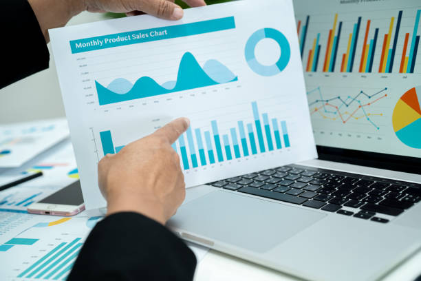 istock Asian accountant working and analyzing financial reports project accounting with chart graph in modern office, finance and business concept. 1729890771