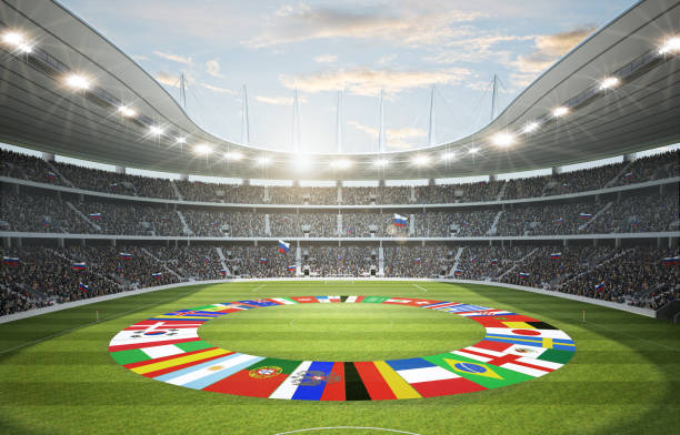 Panoramic view of sport stadium or arena with crowd on a sunny day. Portions of its green grass are shaded, while other parts are exposed to sunlight. Stadium seating stretches across the middle portion of the image, and the seats are filled with spectators. The image is fully made in 3D.