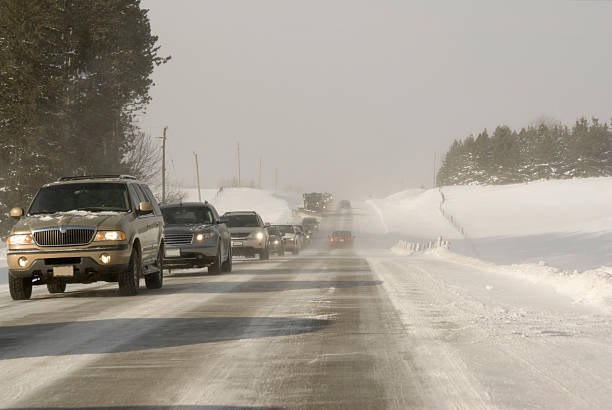 istock Winter Driving - parade of SUVs 172990889