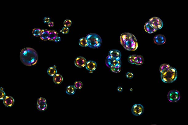 istock Soap bubbles isolated on a black background 1729911812