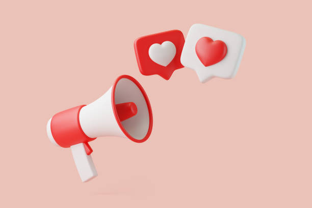 istock Cartoon megaphone heart sign on notification speech bubble on pink background 1729913517