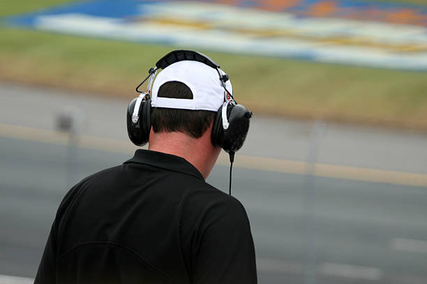 istock Man at Racing Event Wearing Earmuffs 172991447