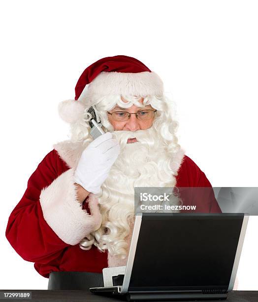 Santa On Phone With Laptop Stock Photo - Download Image Now - Christmas, Color Image, Communication