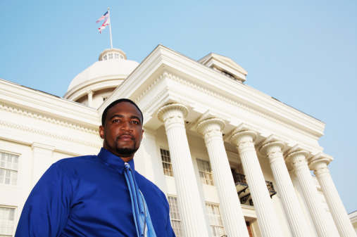 African American male in front of Alabama capital