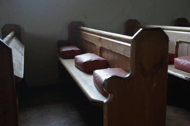 istock Sunlight on church pews 172992051
