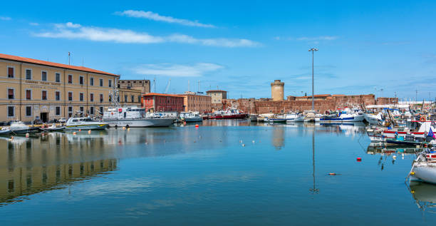 Scenic sight from the harbour of the city of Livorno on a summer morning. Tuscany, Italy. July-22-2023 Scenic sight from the harbour of the city of Livorno on a summer morning. Tuscany, Italy. July-22-2023 livorno stock pictures, royalty-free photos & images