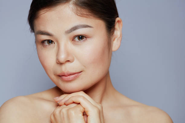 istock modern asian woman on blue 1729923988