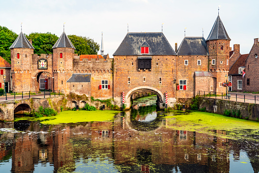 Amersfoort, Netherlands - July 22, 2022: Koppelpoort (fortified medieval gate from 1425) in Amersfoort, Netherlands.