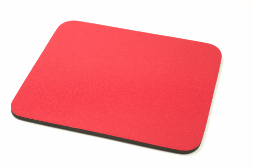 Red mouse pad isolated on white background