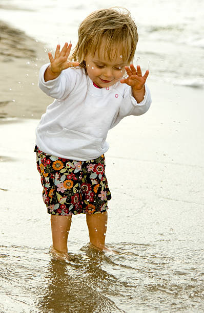istock Small girl having fun at the beach 172993714